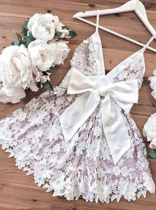 Charming A-Line V-Neck Spaghetti Strap Lace White Homecoming Dress With Bow