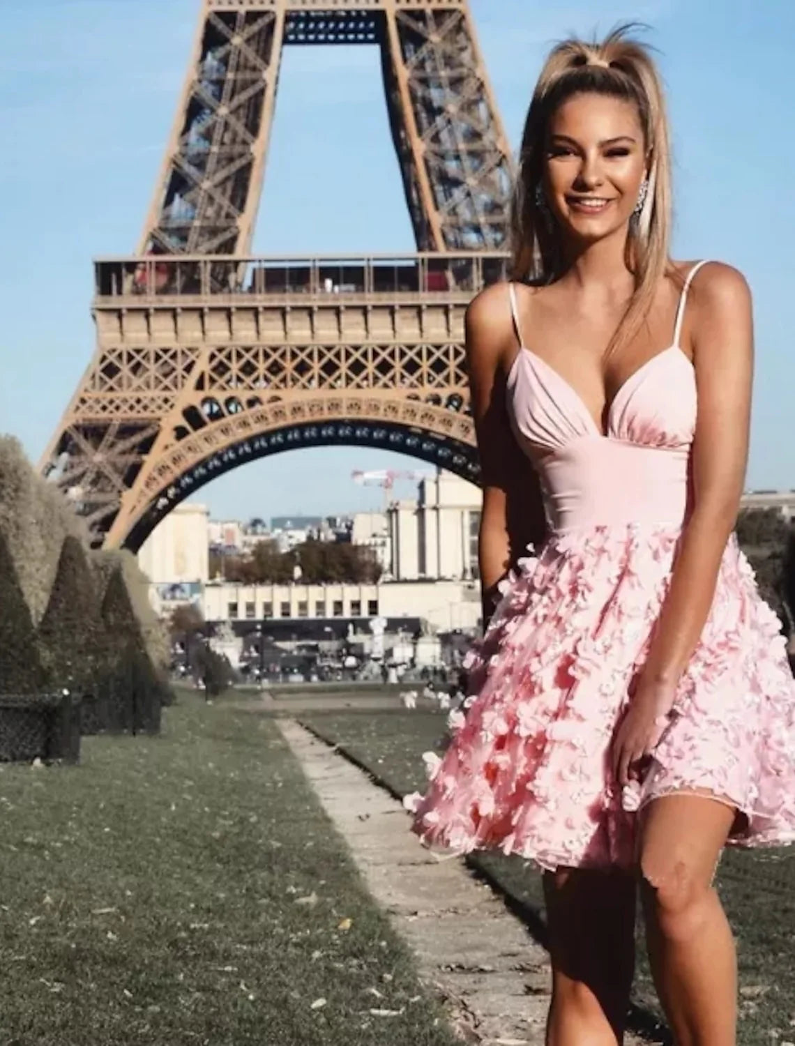 Back view of the A-line spaghetti strap dress with appliques.