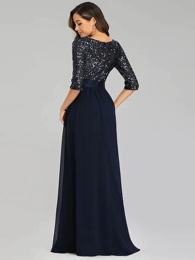 Back view of a woman wearing a sparkling A-line formal evening dress.