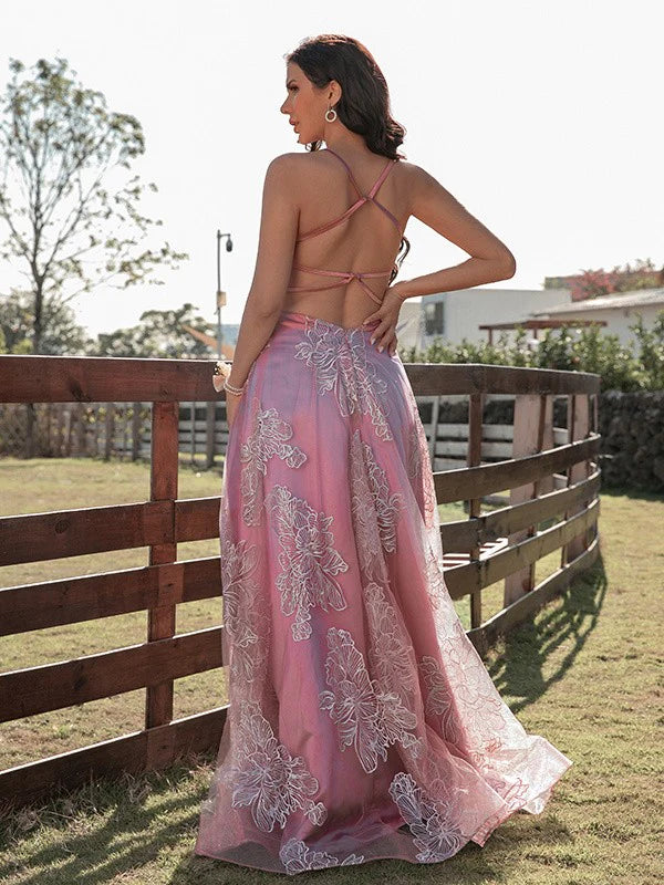 Full view of a sleeveless V-neck floor-length prom gown.