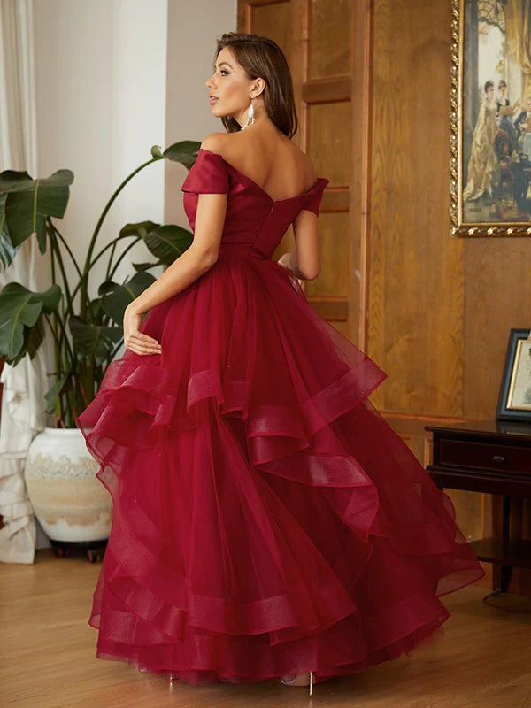 Front view of the A-line princess off-shoulder prom dress, highlighting the tulle fabric and ruffles.