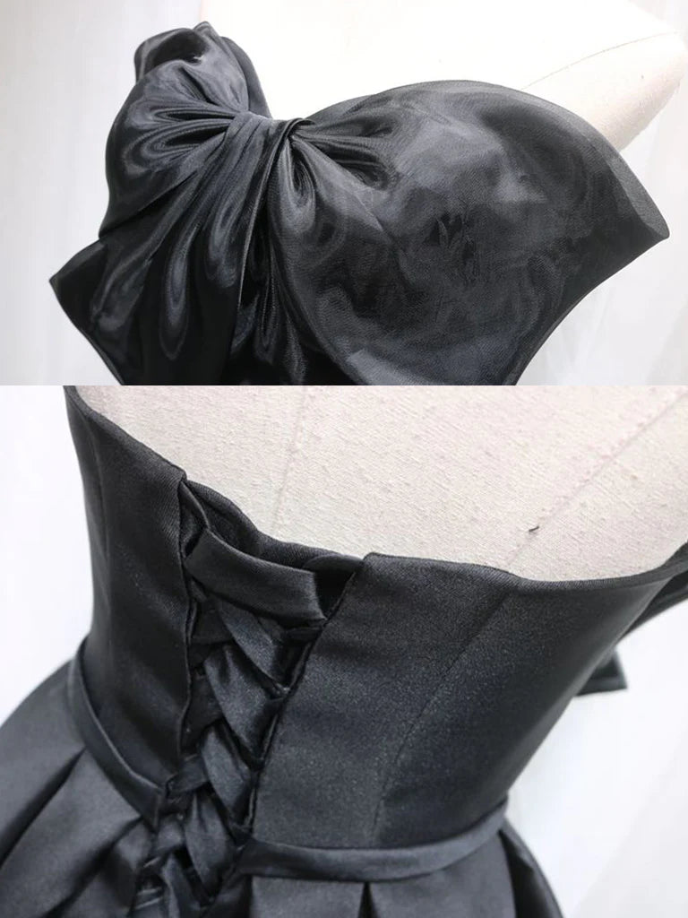Back view of a black satin A-line short dress.