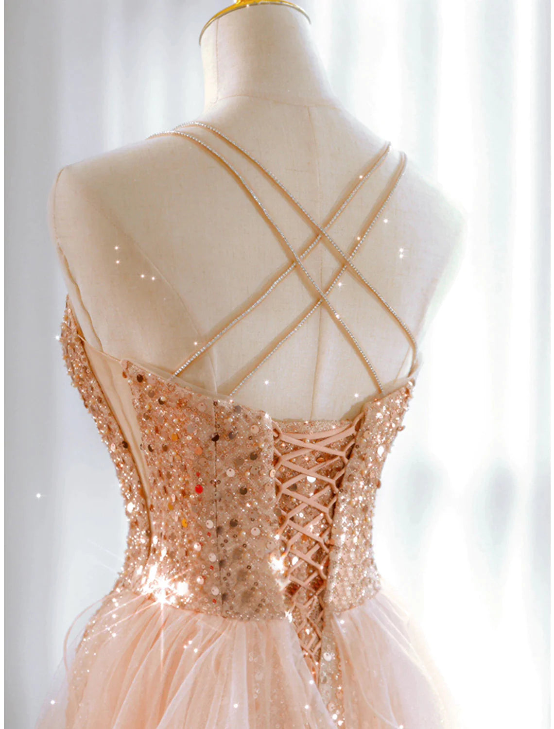 Model walking in the elegant floor-length A-line party gown.