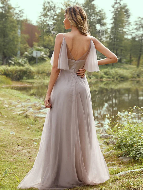 Elegant A-line bridesmaid dress with tulle ruffles and V-neckline.