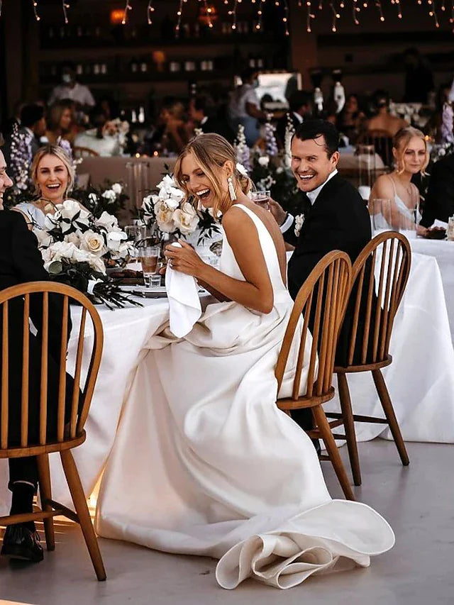 Full length view of A-Line wedding dress with sashes and ribbons.