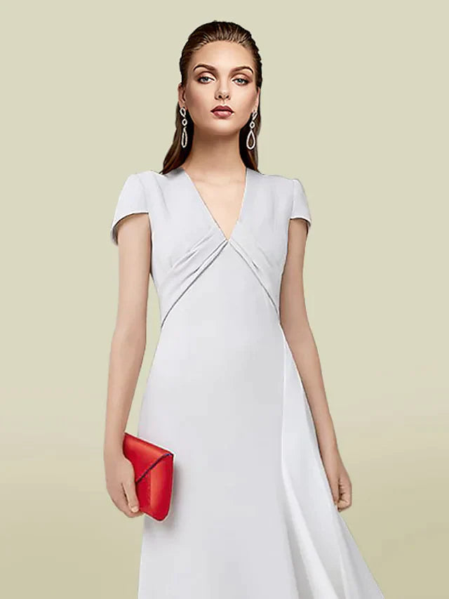 Back view of a floor-length Mother of the Bride gown with a V-neck and short sleeves.