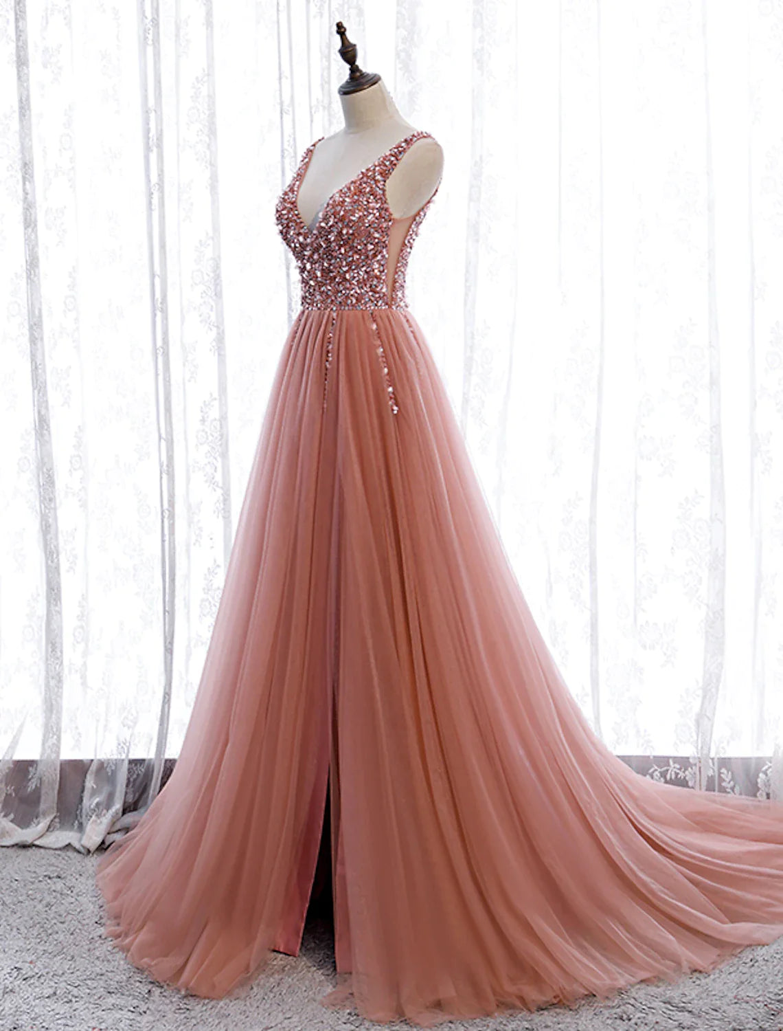 Another full-length view of the A-line prom dress, emphasizing its elegant silhouette and court train.