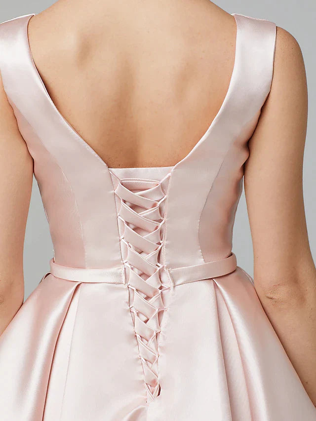 Side profile of an A-line satin homecoming dress.