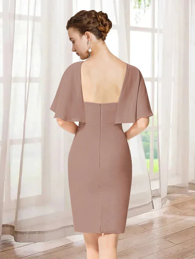 Model showcasing the back of an elegant jewel neck short sleeve ruffled chiffon mini dress.