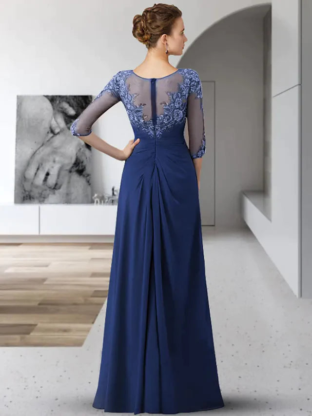 Back view of the elegant Mother of the Bride dress, showing the flowing chiffon skirt and lace sleeve details.