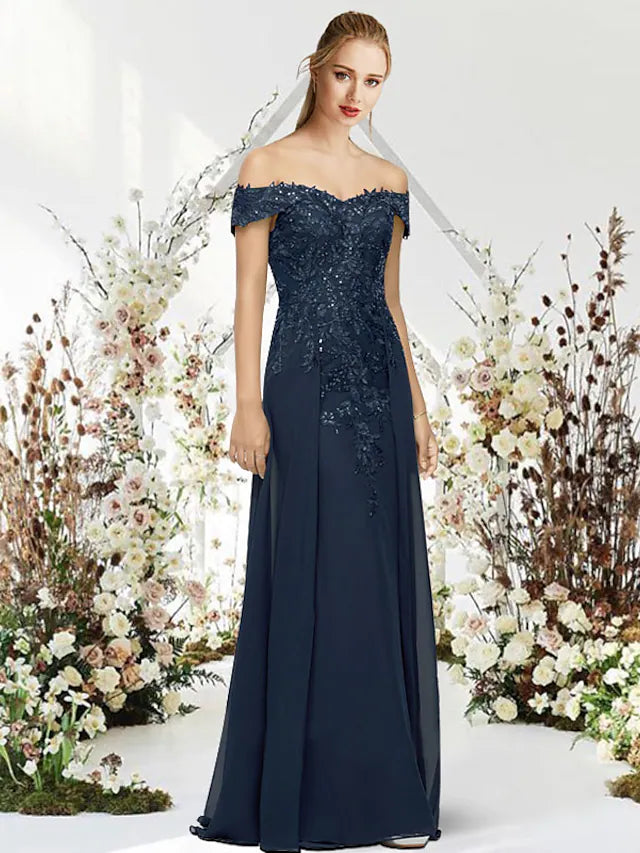 Detailed view of the bodice and off-shoulder sleeves of the elegant chiffon evening dress.