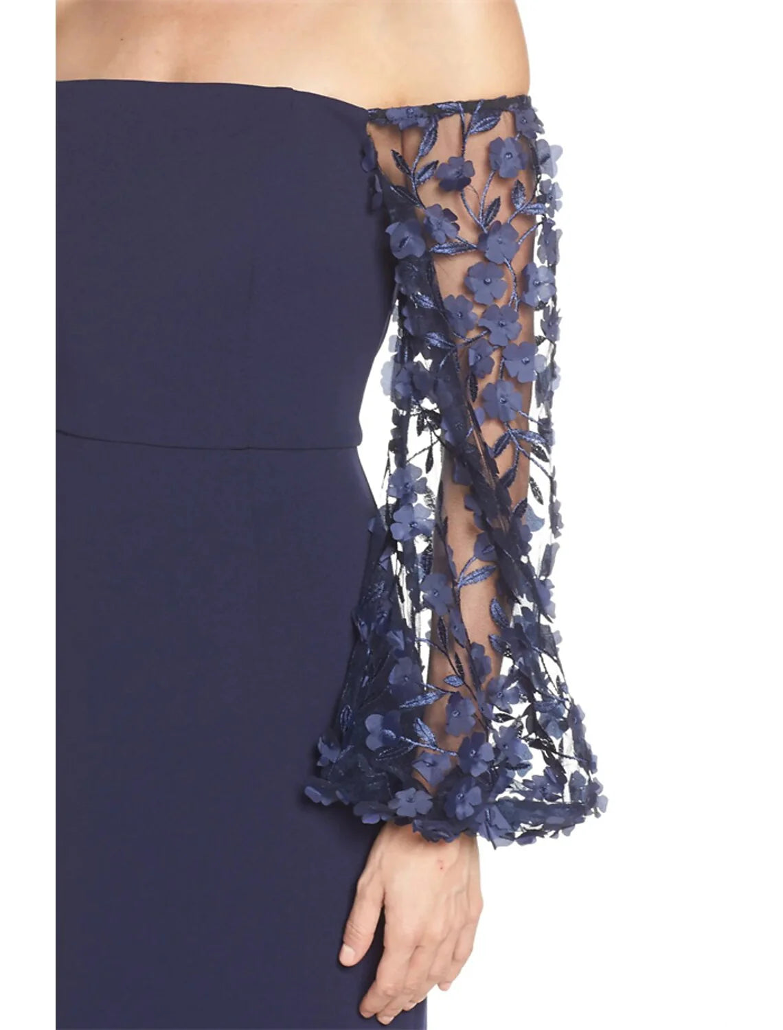 Back view of the elegant mermaid trumpet gown, showing the fitted silhouette.