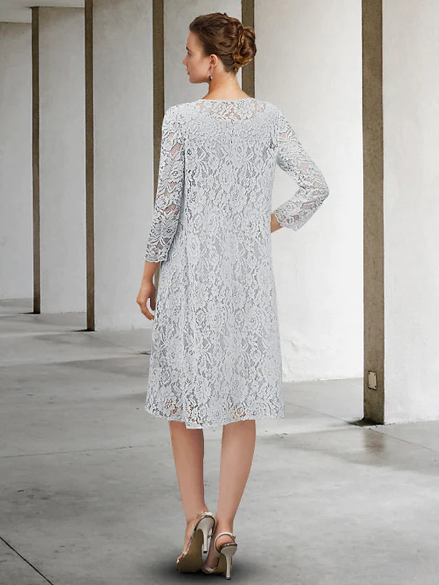 Knee-length chiffon lace dress featuring a V-neckline and long sleeves, perfect for formal events.