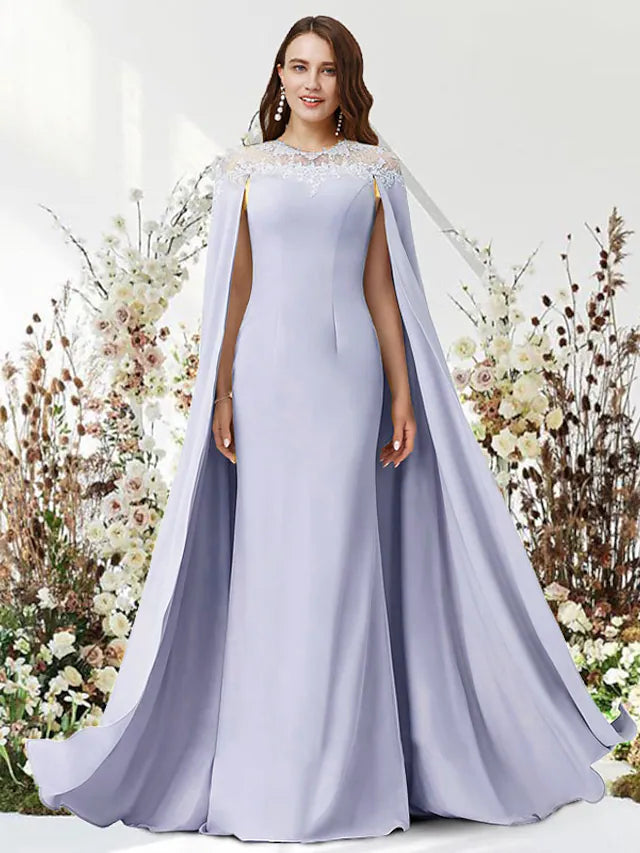 Detail of the jewel neck and flowing chiffon fabric on the two-piece gown.