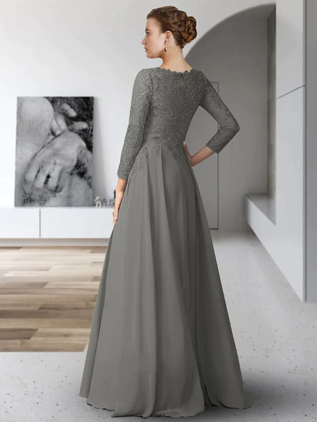 Close-up of the V-neckline and lace details on the 3/4 sleeve of the formal dress.