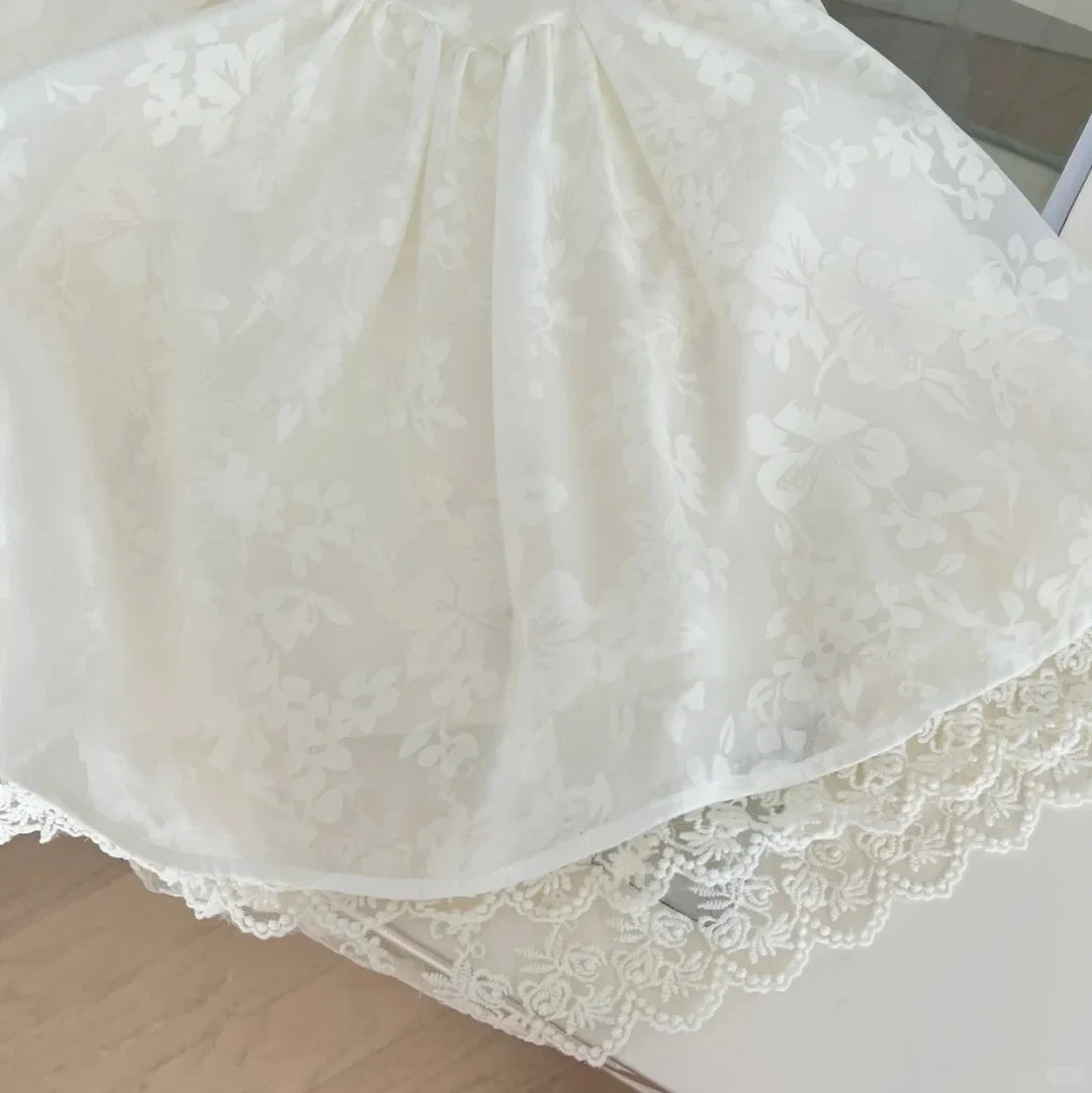 Lovely A-Line Round Neck Sleeveless Ruffled Bow-Accent Ivory Mini Homecoming Dresses