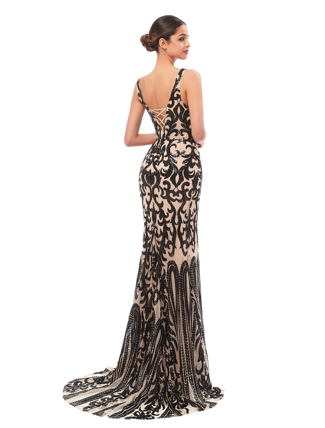 Close-up of the sequin and tulle fabric on the mermaid trumpet evening gown.