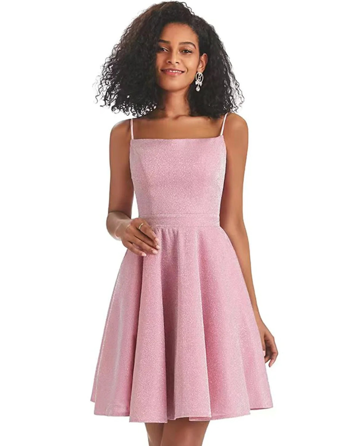 Model wearing a pink A-line backless mini dress with sequin spaghetti straps.
