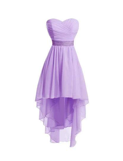 Side profile of the A-line tiered chiffon dress with asymmetrical hem.