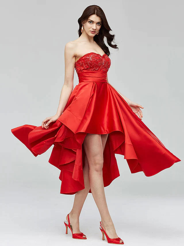 Front view of a blue A-line fit and flare dress with sweetheart neckline and beading.