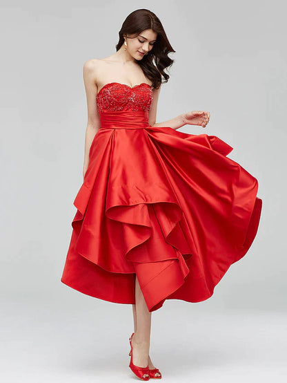 Full length view of a woman wearing the blue A-Line fit and flare prom dress.