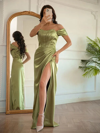 Front view of a rose gold off-the-shoulder floor-length prom dress.