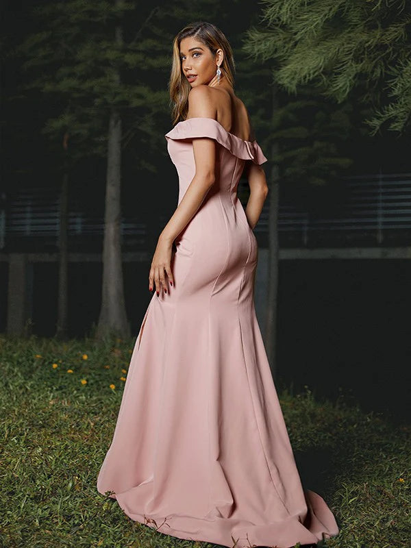 Close-up of the off-shoulder ruffled neckline on a stretch crepe bridesmaid dress.