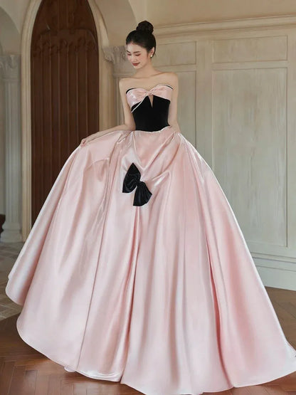 Chic Ballgown Strapless Sleeveless Bow-Trim Blush-Black Floor-Length Prom Dress for Women
