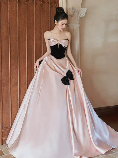 Chic Ballgown Strapless Sleeveless Bow-Trim Blush-Black Floor-Length Prom Dress for Women