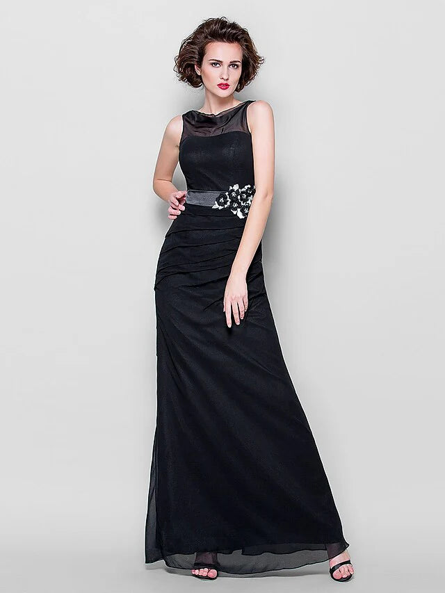 Woman wearing an elegant blue cowl neck georgette Mother of the Bride gown.