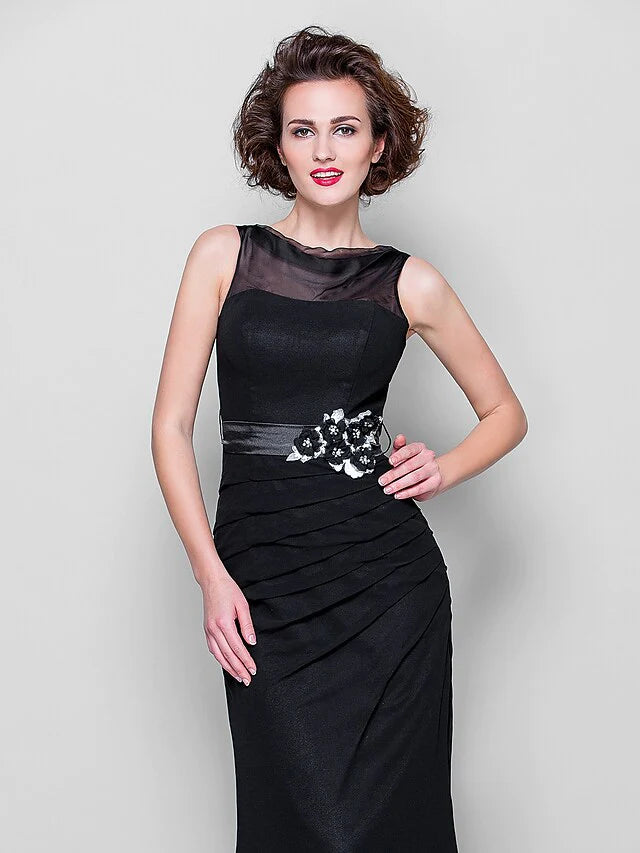 Back view of the blue georgette gown, showing the flowing fabric.