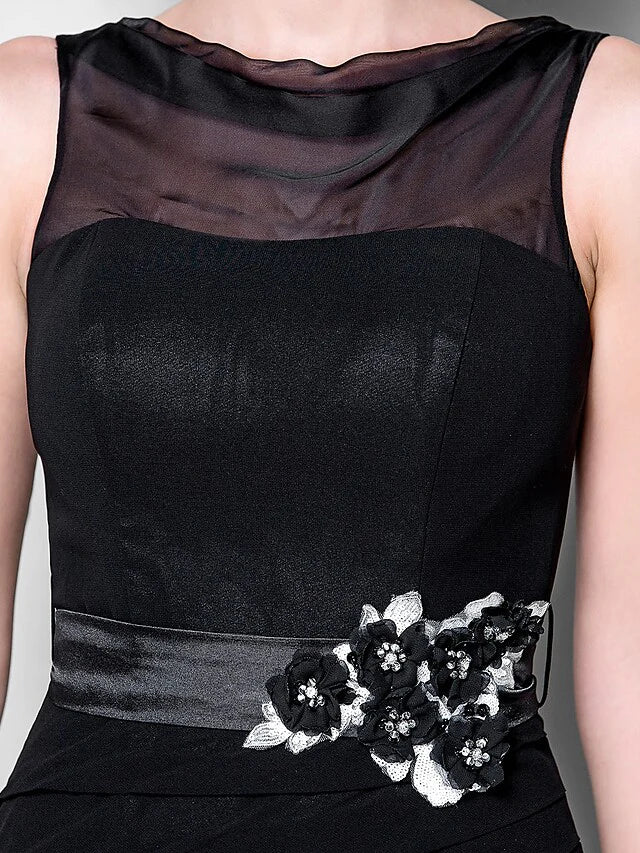 Detail of the beading and appliques on the blue georgette formal gown.