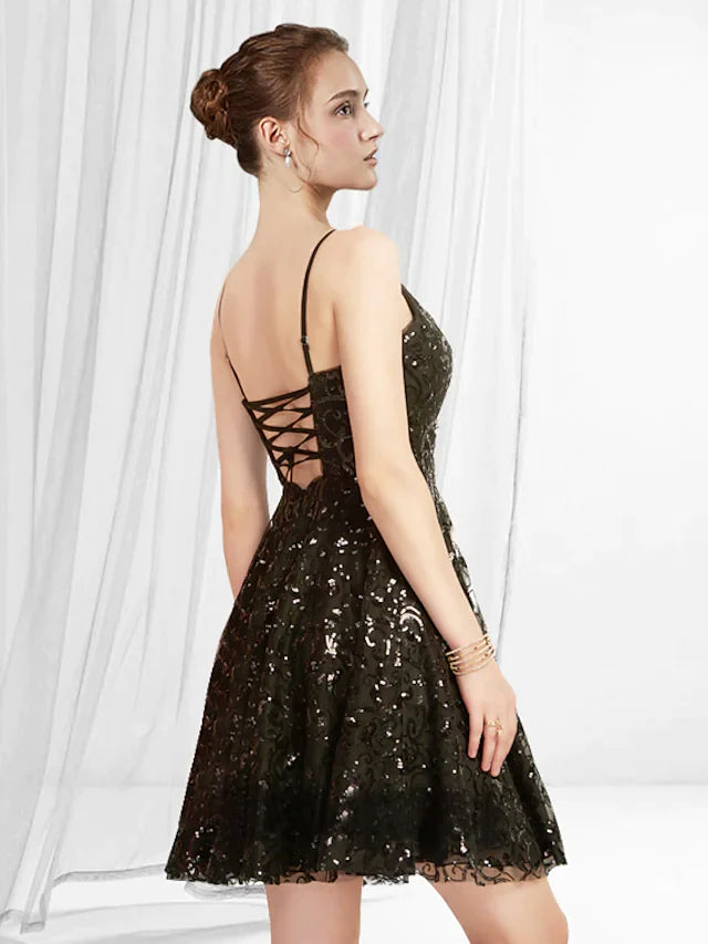 Elegant A-line V-neck short mini dress with glittering sequins and pleats, worn by a model.