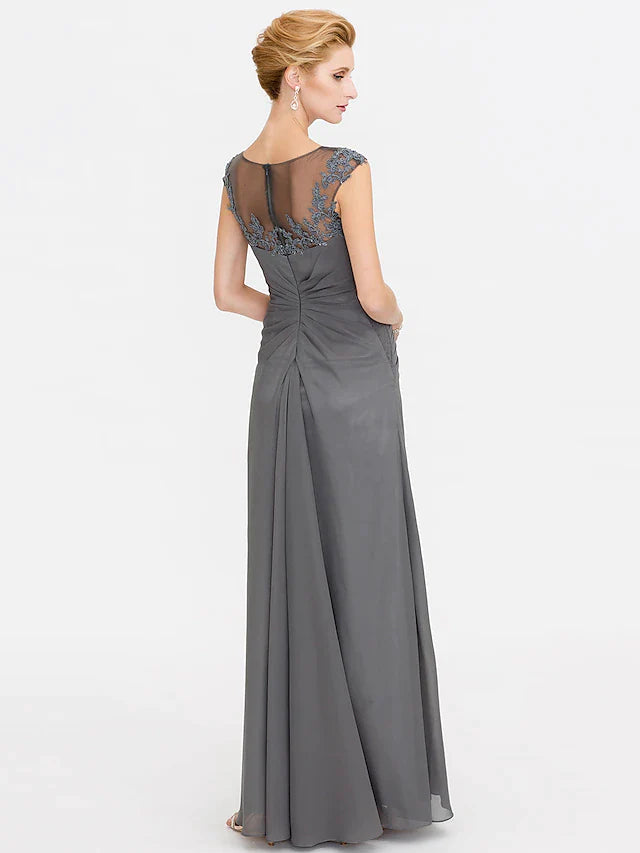 Side view of A-line chiffon lace gown with floor length skirt.