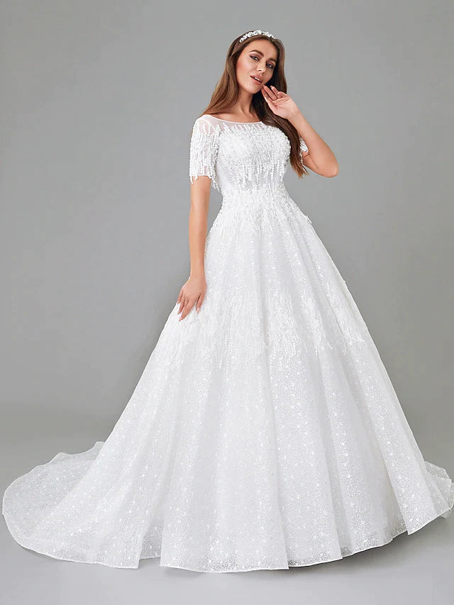 Full view of an elegant A-Line wedding dress with a bateau neck and short sleeves.