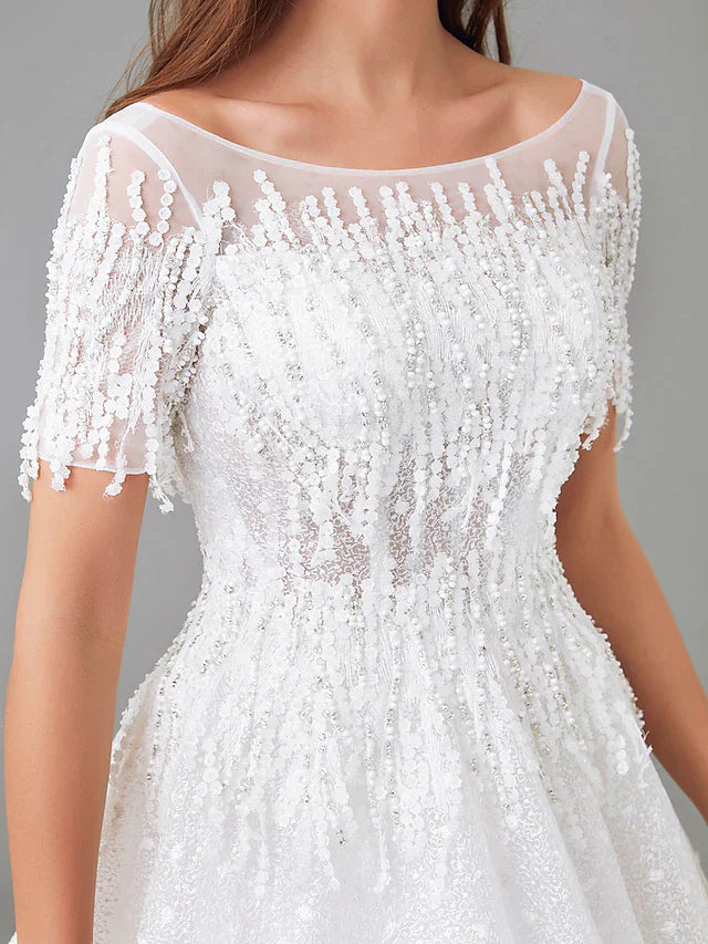 Back view of the A-Line wedding dress, showcasing the court train and lace details.