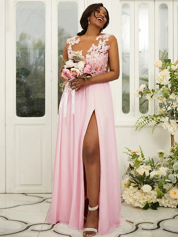 Woman wearing an elegant A-line chiffon bridesmaid dress with delicate applique and a scoop neckline.