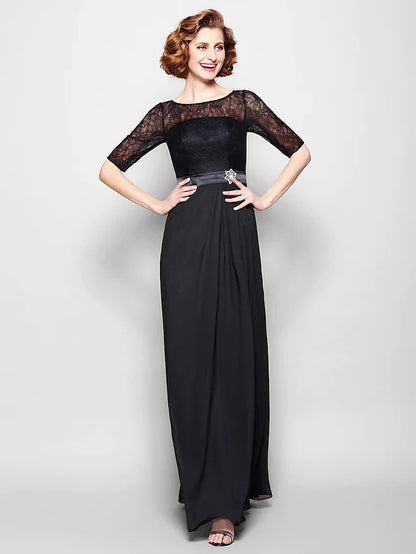 Woman in an elegant A-line mother of the bride dress with jewel neck and half sleeves.