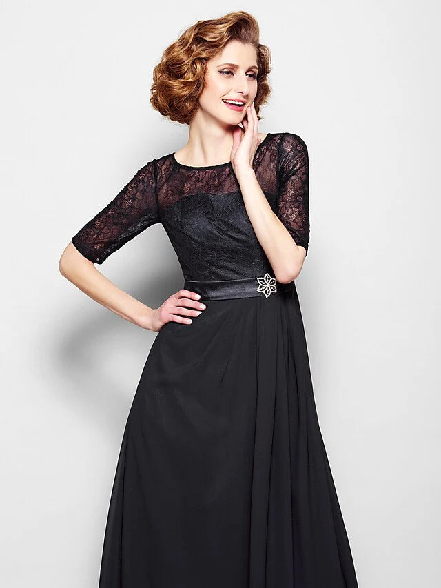 Close-up of the jewel neck and intricate lace bodice on the A-line dress.
