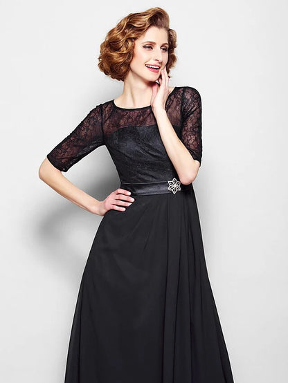 Close-up of the jewel neck and intricate lace bodice on the A-line dress.