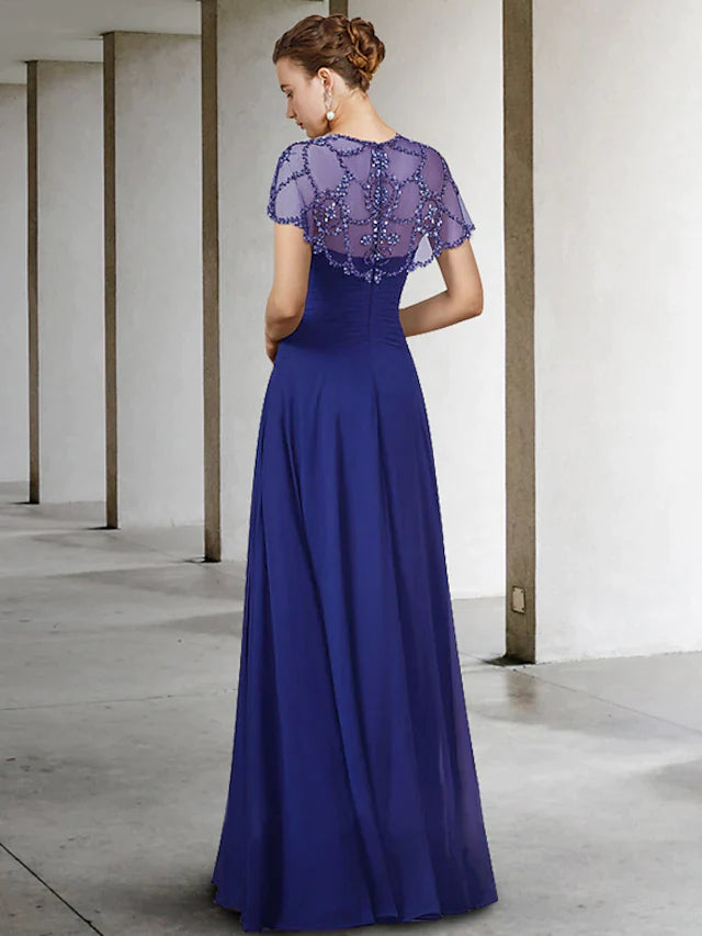 Close-up of the beaded jewel neck and short sleeves on an A-line chiffon Mother of the Bride dress.
