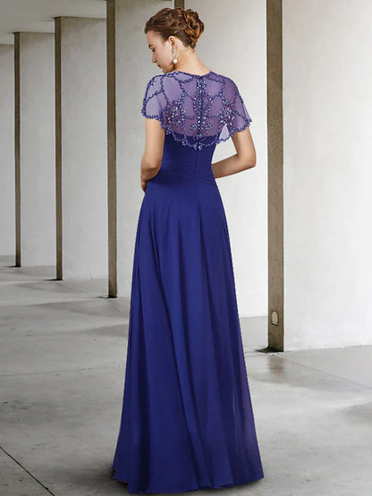 Close-up of the beaded jewel neck and short sleeves on an A-line chiffon Mother of the Bride dress.