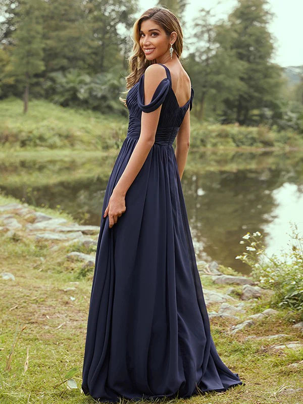 Back view of an A-line chiffon bridesmaid dress, showcasing its flowing skirt and elegant silhouette.