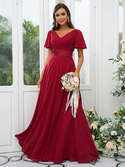 Back view of the A-line chiffon bridesmaid dress showing the train.