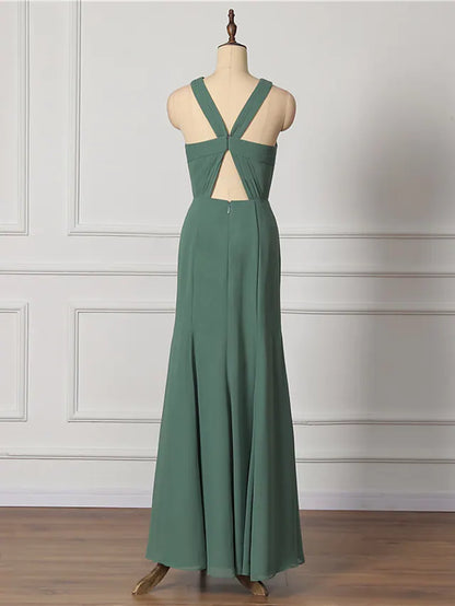 Full view of a flowing A-line bridesmaid dress featuring delicate draping and sleeveless design.