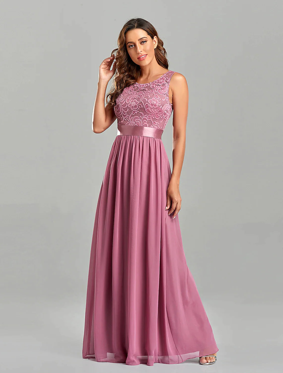 Elegant A-Line Empire Chiffon Evening Gown with Jewel Neck and Short Sleeves.