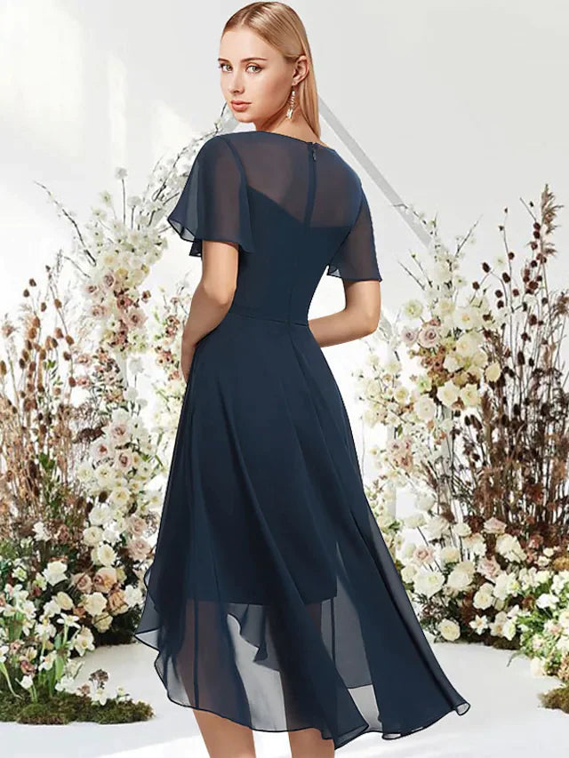 Side view of the A-Line Empire jewel neck dress, highlighting the chiffon fabric and elegant drape.