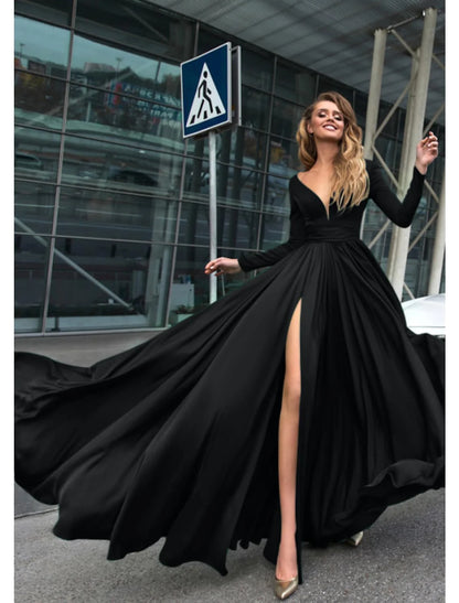 Woman wearing a pure color A-line empire long sleeve V-neck evening gown.