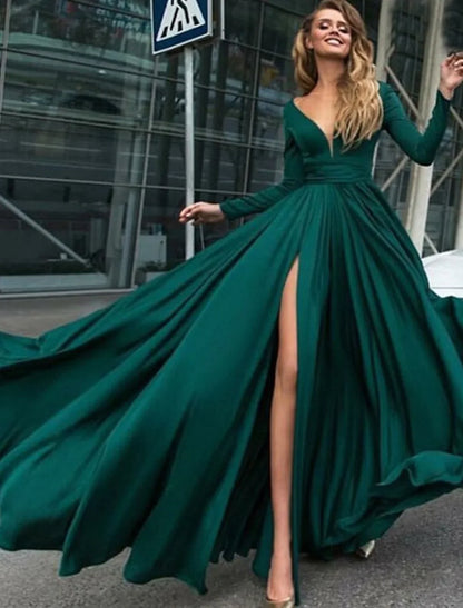 Side view of a woman in a pure color A-line empire long sleeve V-neck evening gown.