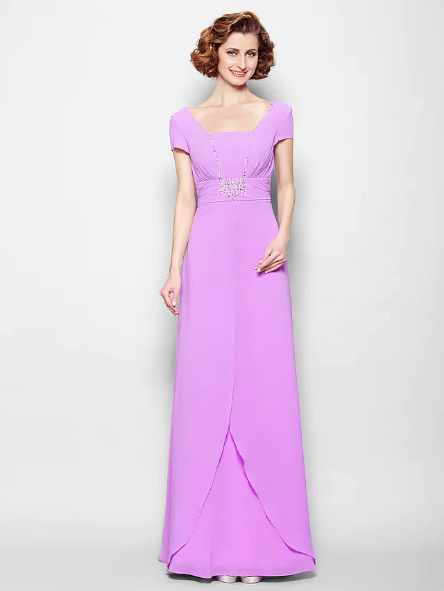 Detailed view of the ruched beading on the bodice of the short sleeve dress.
